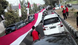 Polres Bolmong Gelar Touring Merah Putih