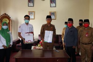 Bupati Iskandar Kamaru Menandatangai (JKN-KIS) BPJS Kesehatan