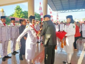Pj Bupati Bolmong Kukuhkan 36 Pasukan Pengibar Bendera