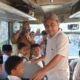 Naiki Bus Sekolah, Bupati Yusra Ikut Antar Para Siswa