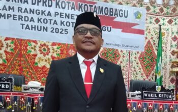 Ketua DPRD Kotamobagu Adrianus Mokoginta