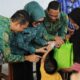 Wali Kota Kotamobagu Serahkan Bantuan bagi Keluarga Penerima Manfaat di Kelurahan Upai