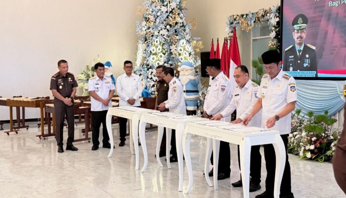 Bupati Iskandar bersama Kepala Daerah se-Sulut Teken MoU serta PKS dengan Kejati Sulawesi Utara